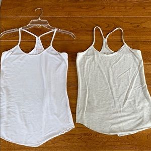 TWO small cami’s / layering tanks